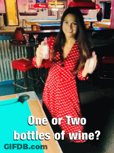 Woman In Red Dress At Pool Table Saying One Or Two Bottles Of Wine GIF