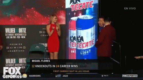 Woman In Red Dress At Tecate Sign GIF