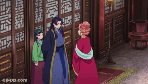 Woman In Red Dress Before Chinese Door GIF