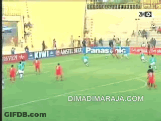 Woman In Red Dress Dancing Before Crowd GIF
