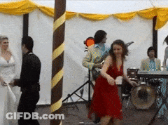 Woman In Red Dress Dancing In Front Of Drummer GIF
