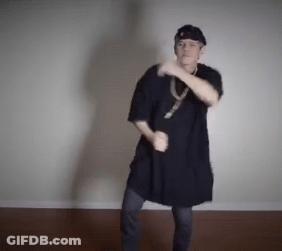 Woman In Red Dress Dancing In Living Room GIF