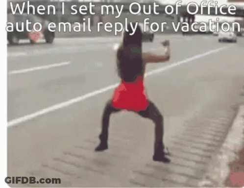 Woman In Red Dress Dancing On Side Of Road GIF