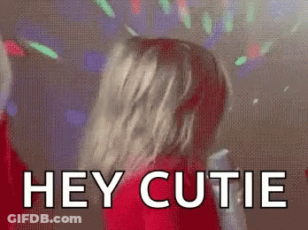 Woman In Red Dress Dancing Under Disco Ball Hey Cutie GIF