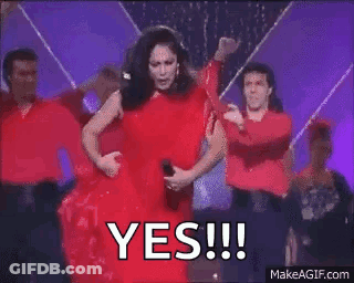 Woman In Red Dress Dancing With Dancers GIF