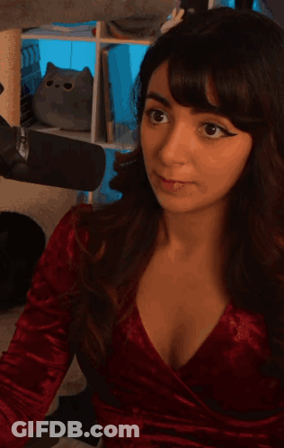Woman In Red Dress Eating GIF