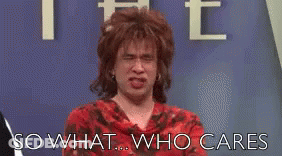 Woman In Red Dress Funny Face Saying So What Who Cares GIF