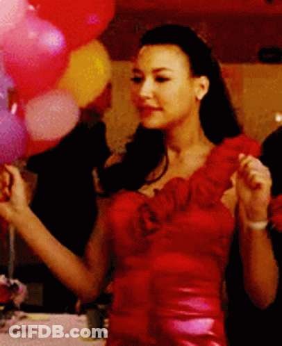Woman In Red Dress Holding Balloons GIF