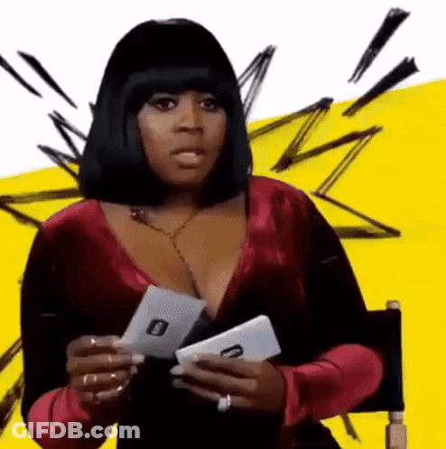 Woman In Red Dress Holding Card With O GIF