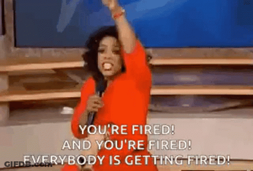 Woman In Red Dress Holding Fist GIF