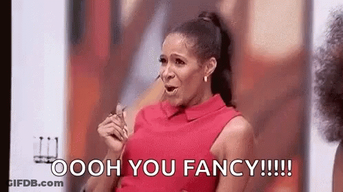 Woman In Red Dress Holding Glasses GIF