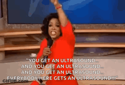Woman In Red Dress Holding Microphone GIF