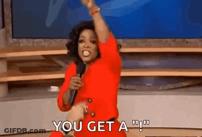 Woman In Red Dress Holding Microphone Dancing GIF