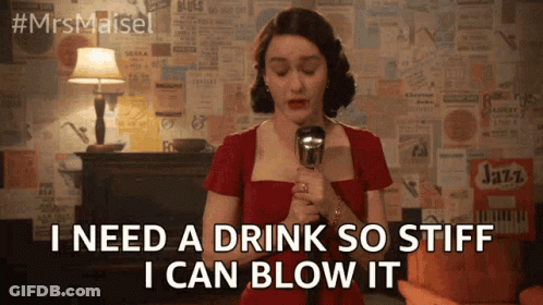 Woman In Red Dress Holding Microphone Saying I Need A Drink So Stiff GIF