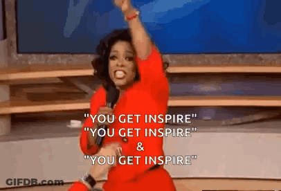 Woman In Red Dress Holding Microphone Saying Inspire GIF