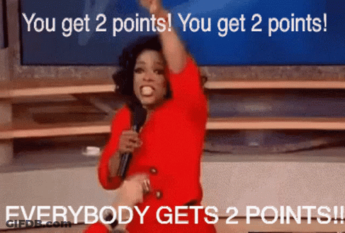 Woman In Red Dress Holding Microphone Says You Get 2 Points Everybody Gets 2 Points GIF