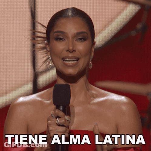 Woman In Red Dress Holding Microphone Tiene Alma Latina GIF