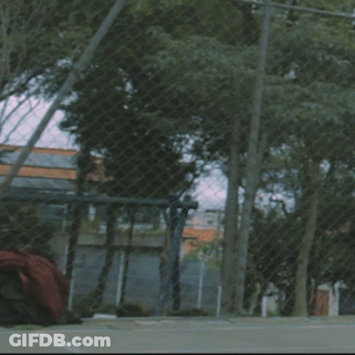 Woman In Red Dress Holding Tennis Racquet GIF