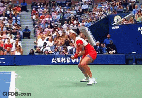 Woman In Red Dress Holding Tennis Racquet GIF