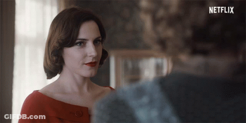 Woman In Red Dress In Front Of Netflix GIF