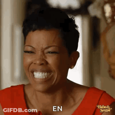 Woman In Red Dress Laughing And Saying En GIF