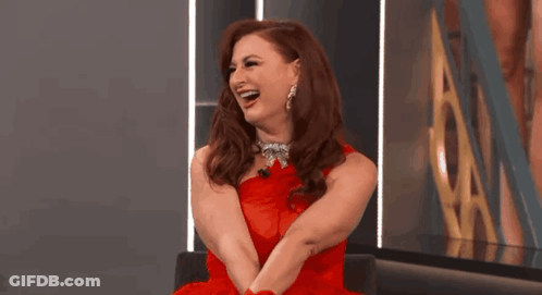 Woman In Red Dress Laughing GIF