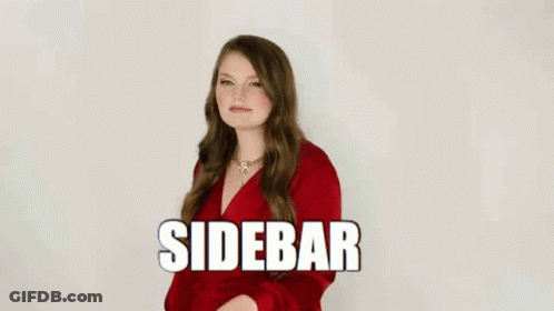 Woman In Red Dress Making Funny Face In Front Of White Wall GIF