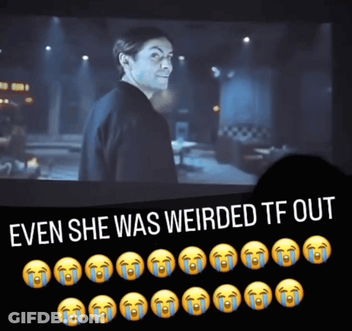Woman In Red Dress Making Hand Gesture On Stairs GIF