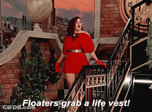 Woman In Red Dress On Stairs Saying Floaters Grab A Life Vest GIF