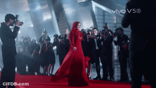 Woman In Red Dress Photographed By Group With Vivo V5s GIF