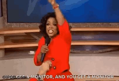 Woman In Red Dress Raising Arm GIF