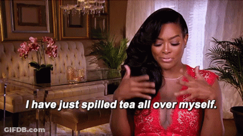 Woman In Red Dress Saying I Just Spilled Tea All Over Myself GIF