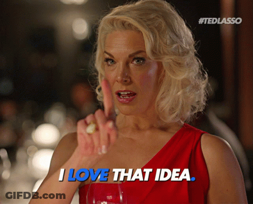 Woman In Red Dress Saying I Love That Idea With Finger GIF
