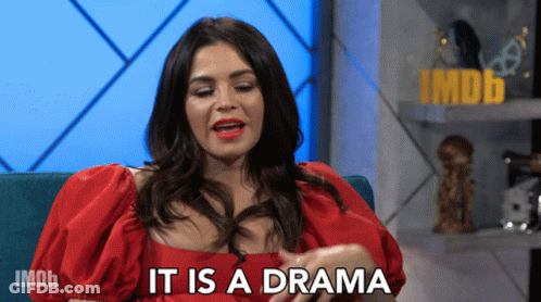 Woman In Red Dress Saying It's A Drama On IMDb GIF