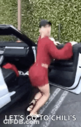 Woman In Red Dress Saying Let's Go To Chili's GIF