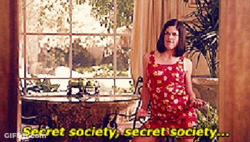 Woman In Red Dress Saying Secret Society GIF