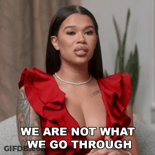 Woman In Red Dress Saying We Are Not What We Go Through GIF