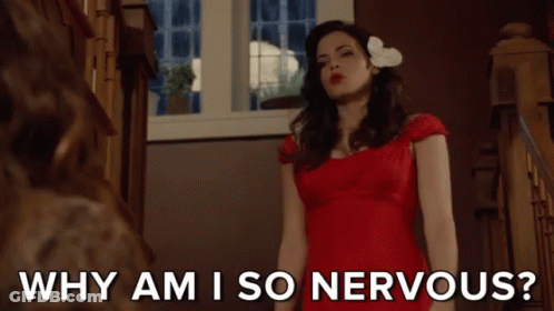 Woman In Red Dress Saying Why Am I So Nervous GIF
