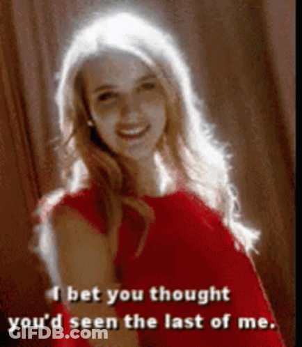 Woman In Red Dress Says I Bet You Thought You'd Seen The Last Of Me GIF