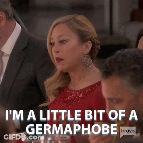 Woman In Red Dress Says I'm A Little Bit Of A Germaphobe Bravo GIF