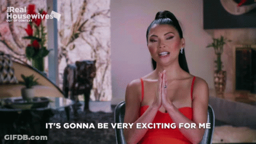 Woman In Red Dress Says It's Gonna Be Very Exciting GIF