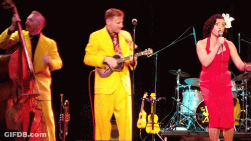 Woman In Red Dress Singing Ukulele GIF
