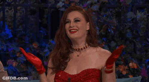 Woman In Red Dress Smiling And Laughing GIF