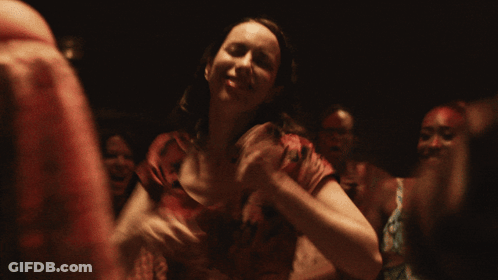 Woman In Red Dress Smiling Dancing GIF