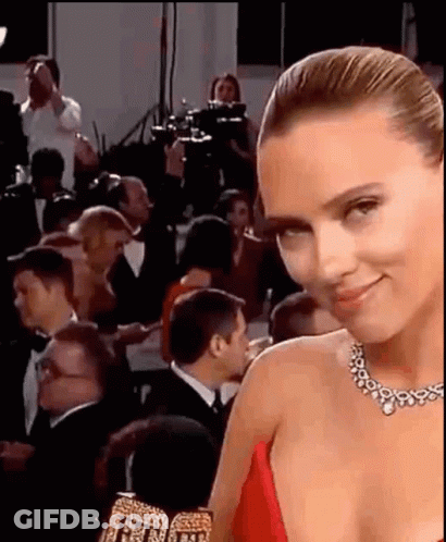 Woman In Red Dress Smiling GIF