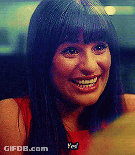 Woman In Red Dress Smiling Saying Yes GIF