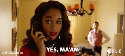 Woman In Red Dress Talking On Phone GIF
