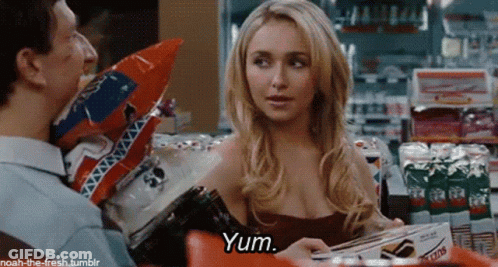 Woman In Red Dress Talking Saying Yum GIF