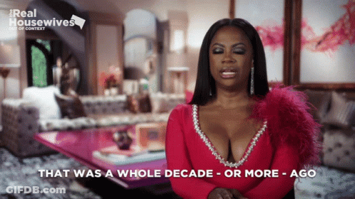 Woman In Red Dress That Was A Whole Decade Ago GIF
