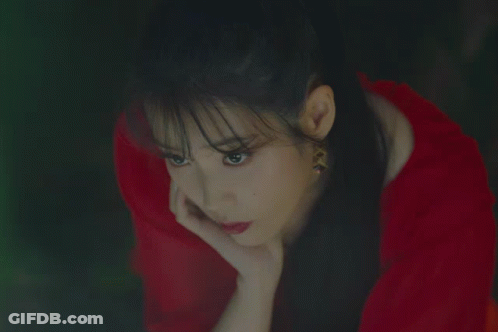 Woman In Red Dress Thinking GIF